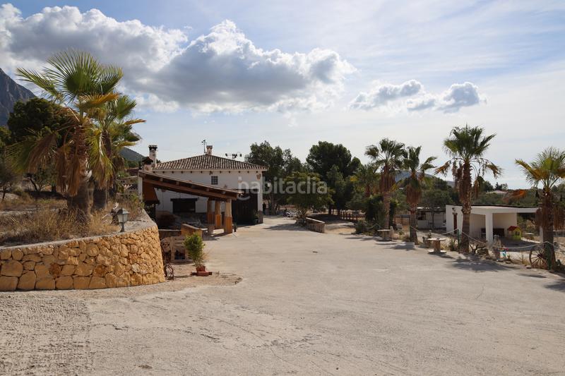 Foto 75830c3b-c1d7-4943-9352-082a0ab8a307. Masia amb xemeneia calefacció aparcament a Finestrat pueblo Finestrat