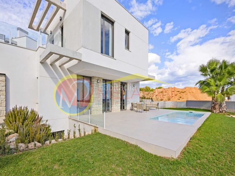 Foto c8574473-66b0-4f81-ae30-641ed842f163. Chalet con parcheggio piscina in Golf Bahía Finestrat