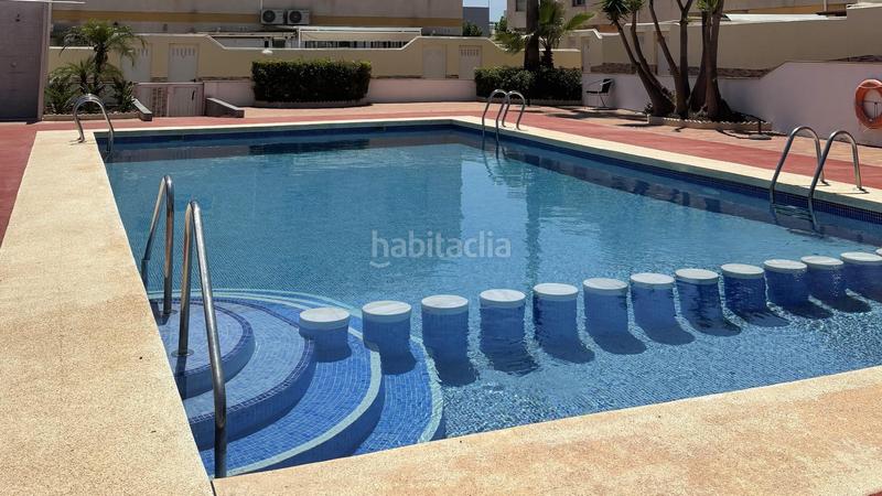 Foto fb257737-cf2e-4a73-b3aa-52f6c87d6cd9. Maison jumelée avec piscine dans Torre de la Horadada Pilar de la Horadada