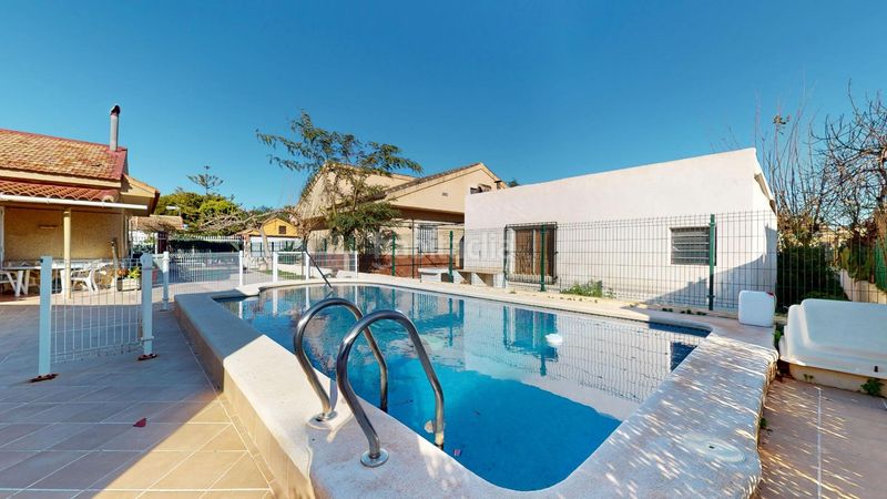 Foto 7927f86e-46c0-40d9-8b9d-480d011d9110. Casa fantástica planta baja independiente con piscina privada en parcela de 470 m2 en bahía bella alcázares en Cartagena