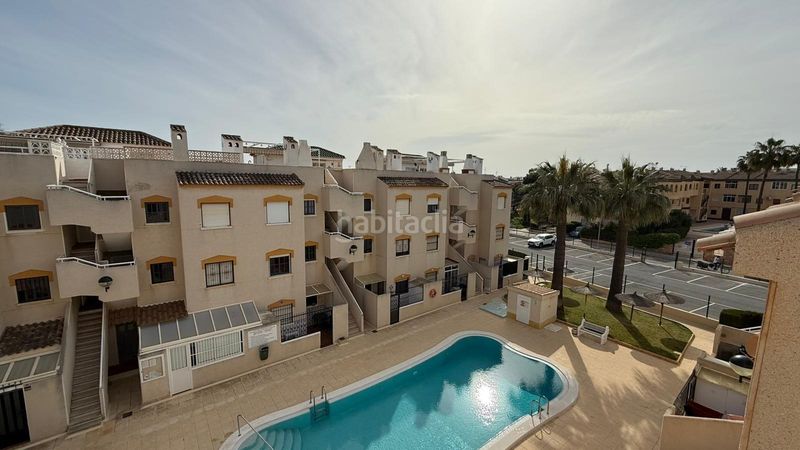 Foto 22af8946-420d-4f3e-915a-2ea172a660cb. Apartament amb aparcament piscina a Punta Prima Orihuela
