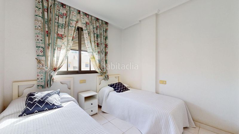 Foto 28eadc92-cd1b-4272-99c9-107ee5875a54. Apartament amb aparcament piscina a Punta Prima Orihuela