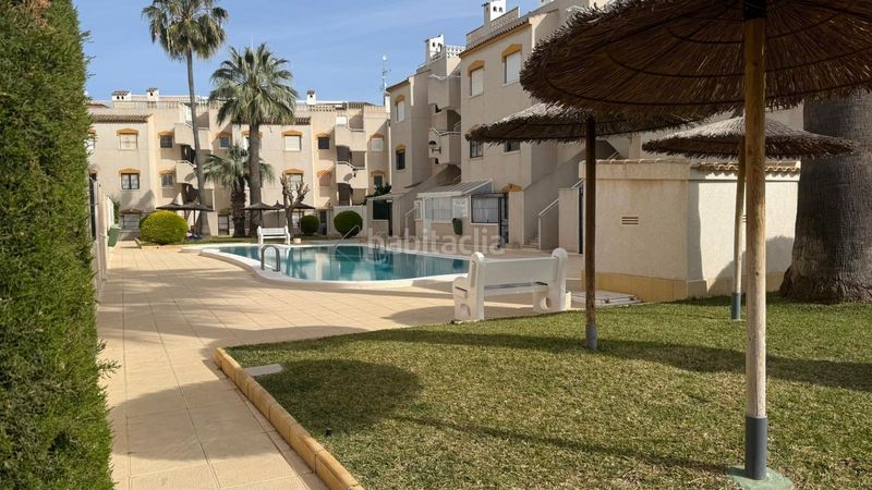 Foto 529d6b05-3012-4c2b-b37f-68afe91739c3. Apartament amb aparcament piscina a Punta Prima Orihuela