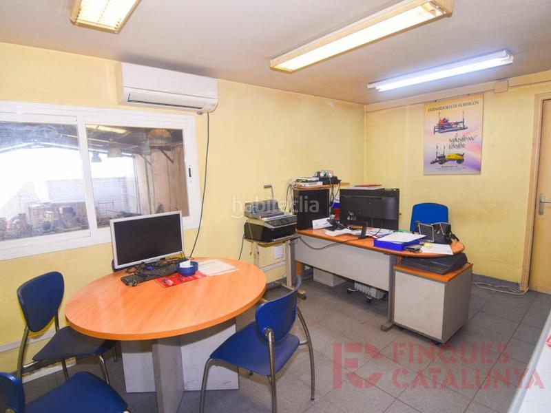 Foto 247d7649-a15e-4ab3-9f72-8a0dff465563. Bâtiment à usage industriel dans Barri dels Escriptors Salt