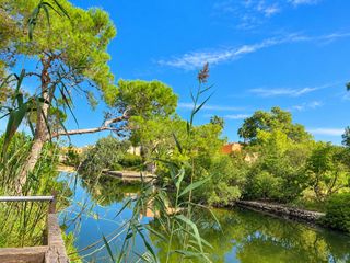 Casa adosada en Port d�Alc�dia-Platja d�lc�dia. Chalet adosado de 4 dormitorios con jard�n, terraza y garaje en