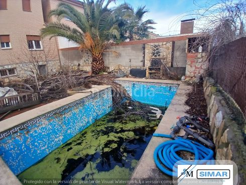 Foto 33a039a7-42eb-4790-b6e8-18054194383c. Casa adossada amb piscina a Nambroca