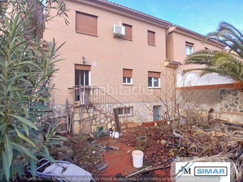 Foto f76cca00-85f7-4470-a6b1-e8944f6b7f49. Casa adossada amb piscina a Nambroca
