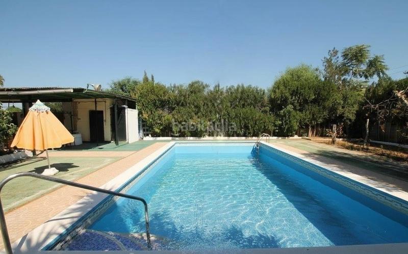 Foto 8bea8793-73db-4e5b-8c94-9e9675ab2b3d. Chalet con riscaldamento parcheggio piscina in Oromana Alcalá de Guadaira