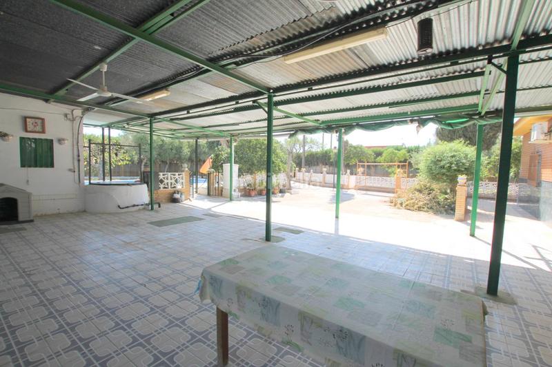 Foto b7b9271d-f8e5-444c-a963-f7f19630351f. Chalet con riscaldamento parcheggio piscina in Oromana Alcalá de Guadaira