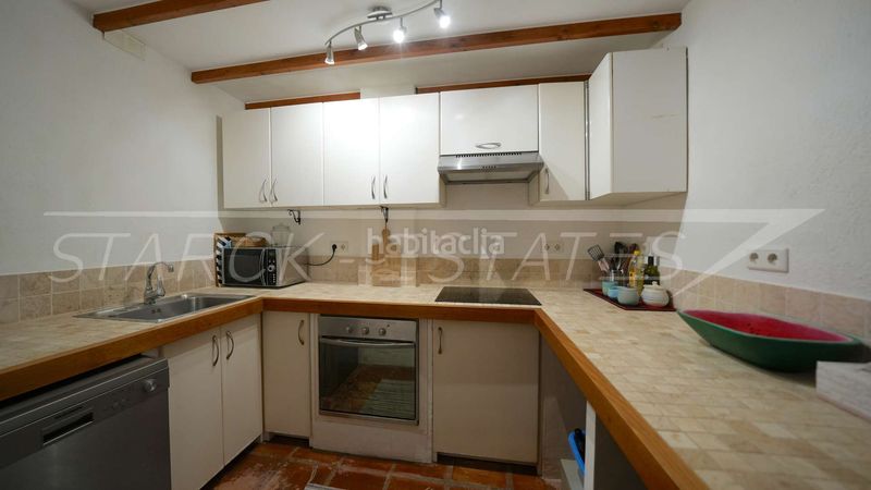 Foto 4d9655d9-eb01-4e71-871b-bcfb400192de. Casa adossada amb xemeneia a Benidoleig