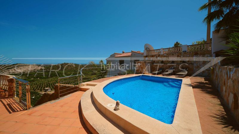 Foto 1a07cbd7-dd24-46e2-8e89-a668c98c4d24. Casa amb xemeneia piscina a Oliva pueblo Oliva