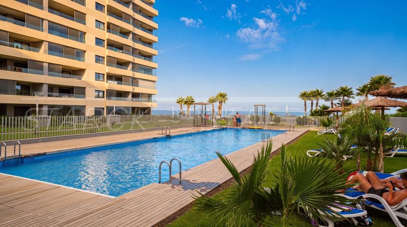 Foto 05e540fb-4f17-44e3-b52a-0ce3486a0c7a. Apartament amb piscina a Punta Prima Orihuela