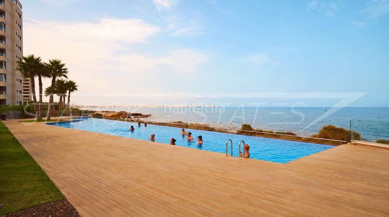 Foto 15714fde-c60b-4f08-9bfe-5f8297325a61. Apartament amb piscina a Punta Prima Orihuela