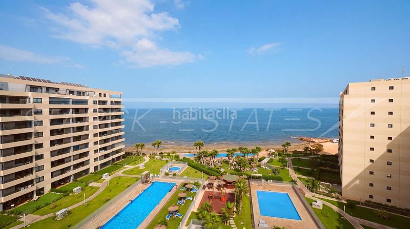 Foto cb4688f3-c4fa-4bd5-96f6-59c5fbfc743c. Apartament amb piscina a Punta Prima Orihuela