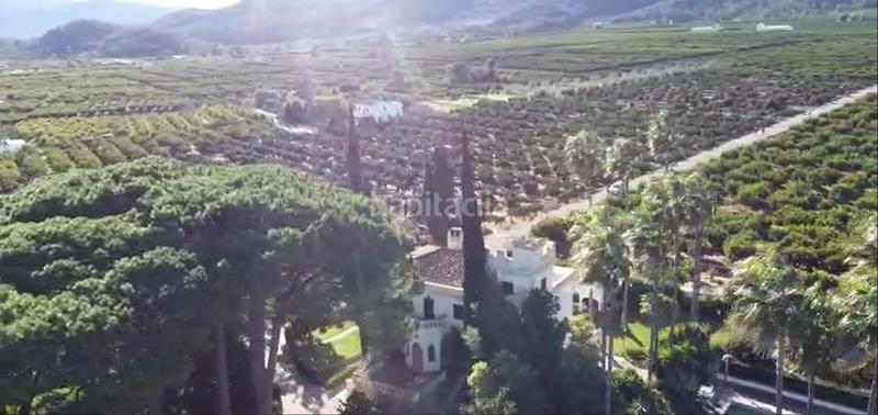 Foto 47893972-78bc-46d9-9391-a70ea28036e2. Masia amb xemeneia calefacció aparcament piscina a Gandia