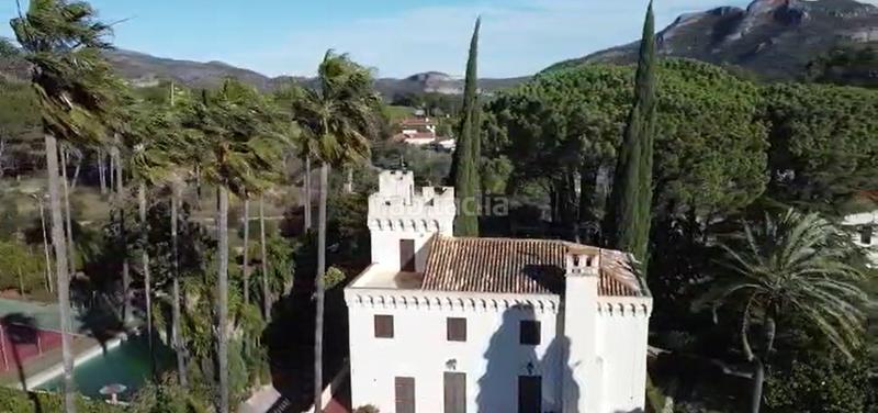 Foto 7c788349-e6ba-4da7-8c90-cee54fc2665d. Masia amb xemeneia calefacció aparcament piscina a Gandia