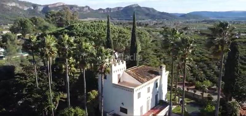 Foto b68fd0ab-2f1e-4580-aed6-71e9b5c2f0cc. Masia amb xemeneia calefacció aparcament piscina a Gandia