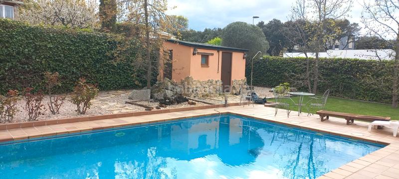 Foto fce2f488-ed37-48e2-a82b-292f79d41e1c. Xalet amb xemeneia calefacció aparcament piscina a Valdemorillo