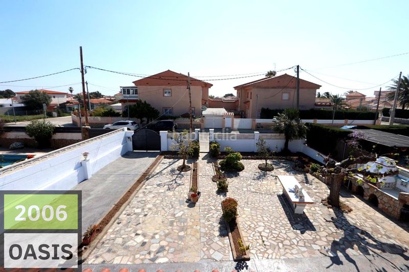 Foto 472d34f6-f4c4-4fe5-bded-9783a635992e. Casa amb aparcament a Centre Miami Platja