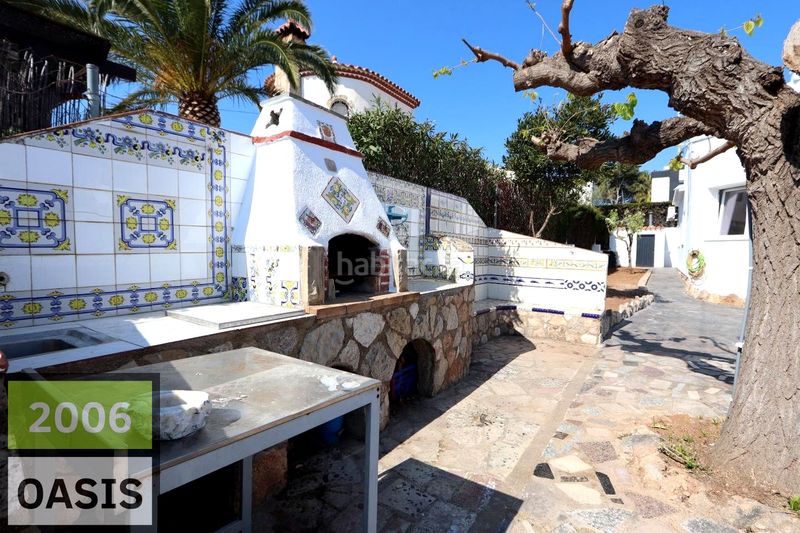 Foto 5b0aef68-6bb8-4330-b478-fdb5768d8df7. Casa amb aparcament a Centre Miami Platja