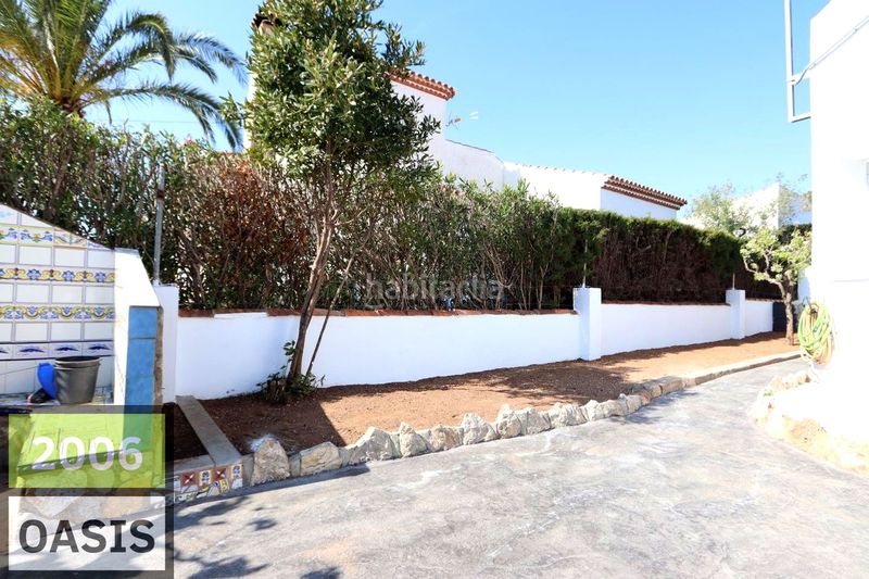 Foto 6fd28c64-01b7-4c19-852a-9034f5e73916. Casa amb aparcament a Centre Miami Platja