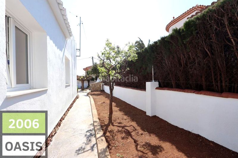Foto 8664e95b-5575-4508-9758-c8bdeefbd68b. Casa amb aparcament a Centre Miami Platja