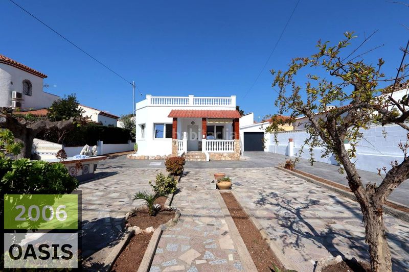 Foto 97ea0bff-adf9-4e5d-992d-85e8e324ef4c. Casa amb aparcament a Centre Miami Platja