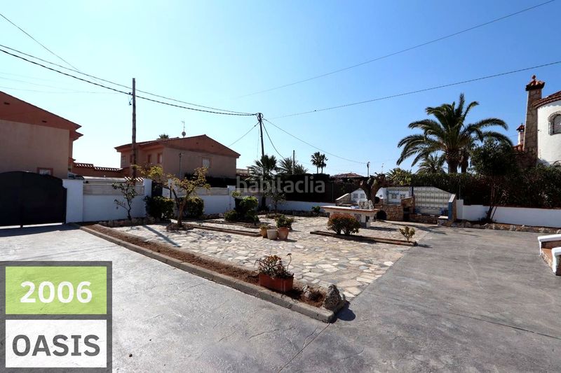 Foto bd113b8d-5084-4d28-9a09-0b11c0fdc862. Casa amb aparcament a Centre Miami Platja