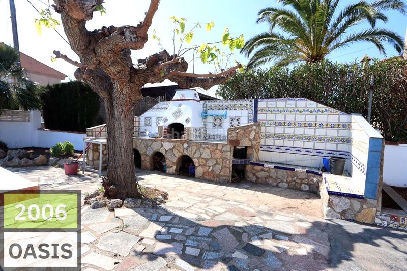 Foto f18037da-0f65-42be-b52f-9ed71c56412d. Casa amb aparcament a Centre Miami Platja