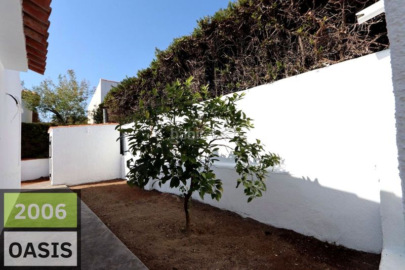 Foto f7ca32fa-3c81-4aeb-b420-2a86e85caea8. Casa amb aparcament a Centre Miami Platja