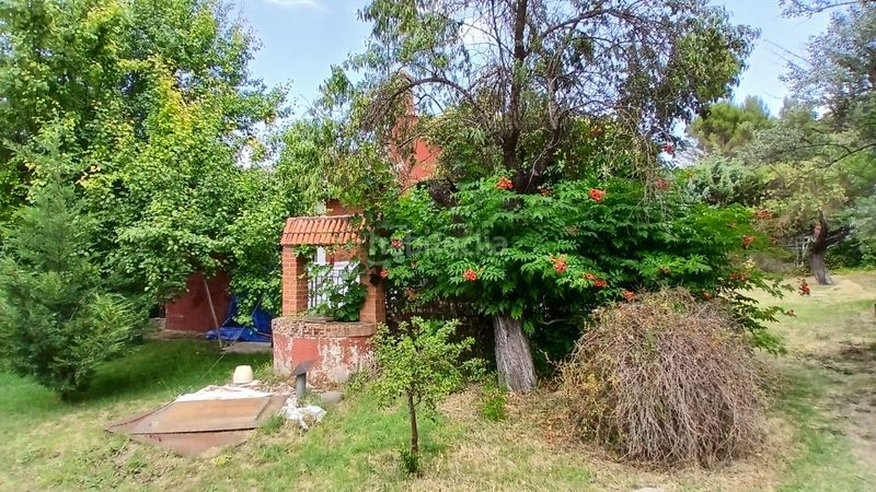 Foto b1a25d2c-fccb-4e12-8c38-a99b0a4dda53. Casa amb xemeneia calefacció aparcament a Tielmes