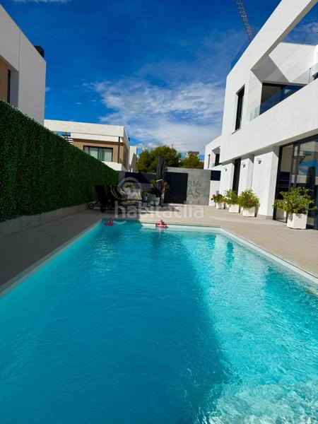 Foto 0a08f122-713d-4ac8-8b10-14ed2a0c042e. Xalet amb calefacció aparcament piscina a balcón de Finestrat-terra marina Finestrat