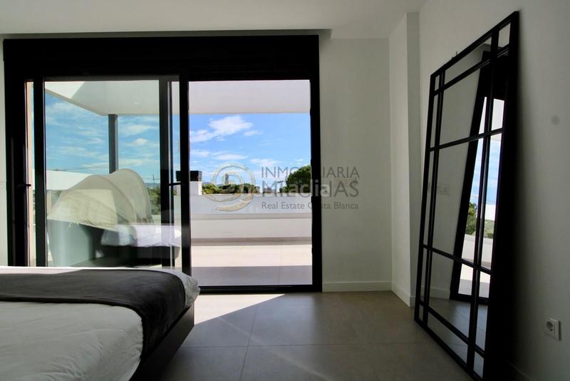 Foto 303c2b6d-8d99-43a7-ba28-d8f8e0a59a17. Xalet amb calefacció aparcament piscina a balcón de Finestrat-terra marina Finestrat