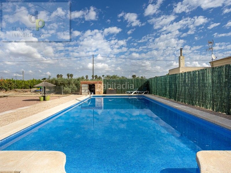 Foto c690e30d-4adf-4e55-b2c5-c2e831ff077d. Xalet amb xemeneia piscina a La Foia - Daimés - Asprella Elche / Elx