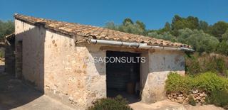 Masia  Camí tossal roig. Masia adosada con terreno