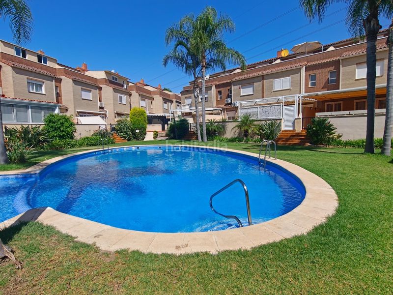 Foto 0094f45b-dbd3-437c-ac68-d5d2f38505fc. Casa adossada amb calefacció aparcament piscina a San Antonio de Benagéber