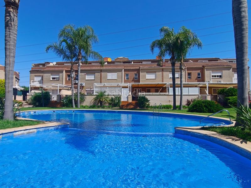 Foto d6cb6648-fb39-4d6a-b482-d640a4c87147. Casa adossada amb calefacció aparcament piscina a San Antonio de Benagéber