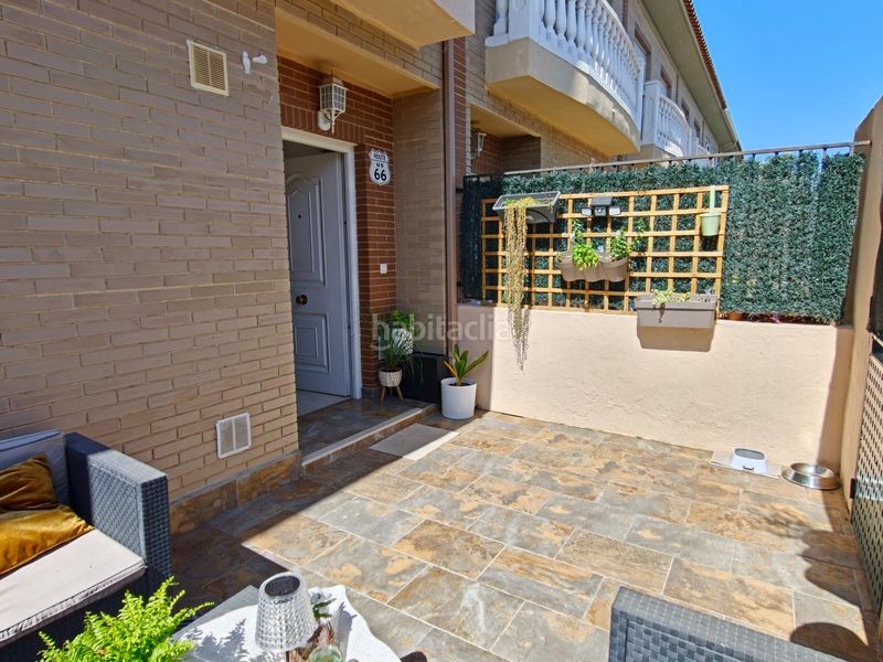 Foto df4f44c0-75bf-4524-8c49-ba1b951d9e78. Casa adossada amb calefacció aparcament piscina a San Antonio de Benagéber