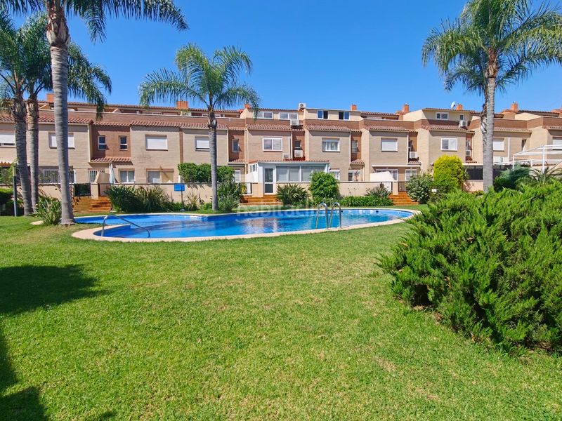 Foto ec1315b6-9f61-4d3d-859e-8e8e12c6bb7f. Casa adossada amb calefacció aparcament piscina a San Antonio de Benagéber