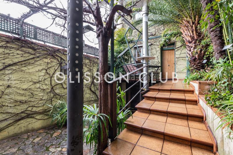 Foto 8d8866ca-2b57-4f8d-a895-6ab9ba5856e5. Casa adosada chalet pareado en hispanoamérica con jardines, garaje y piscina en Madrid