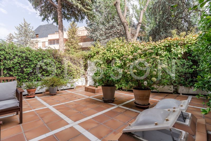 Foto ca1f7a27-a1d9-43fa-afdb-a594f291357e. Casa adossada amb calefacció a el soto de La Moraleja La Moraleja