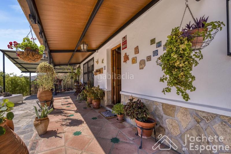 Foto bd168478-e24d-4c8d-a11d-06bb9d245cbf. Casa con parcheggio in Canillas de Aceituno