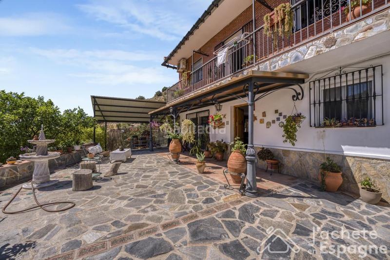 Foto f7c88e10-96d1-4cf6-80d7-a73fca272c57. Casa con parcheggio in Canillas de Aceituno