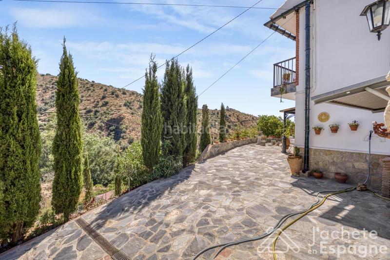 Foto f93d9a5d-6d99-41ce-8fff-c58283235907. Casa con parcheggio in Canillas de Aceituno