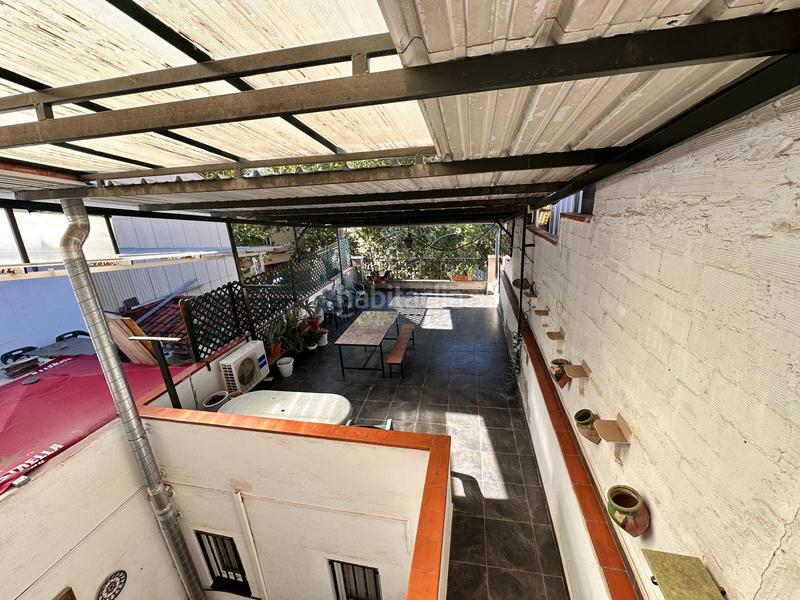 Foto 9987e18b-c48e-4e7d-b9b0-95b25fcdc3fc. Casa adossada amb xemeneia calefacció aparcament a Sabadell