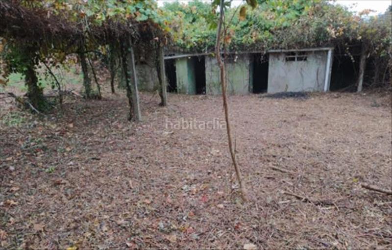 Foto 5115d484-4c1a-4418-96db-43a04a444c6c. Residential plot in O Milladoiro Ames