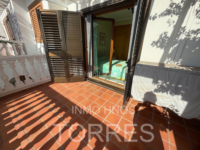 Foto c20f84e8-7c3c-4523-89f8-c494e9c1e73b. Casa adossada amb xemeneia aparcament piscina a Papa Luna - Platja del Gurugú Benicarló