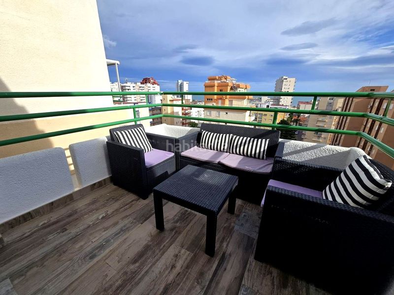 Foto 5417c273-b08c-46d3-9f1e-5bdc04efdca2. Apartamento en calle de la devesa 7 atico playa reformado 3 habitaciones, 2 baños, salon , gran terraza, garaje, jardin, piscina y tenis en Gandia