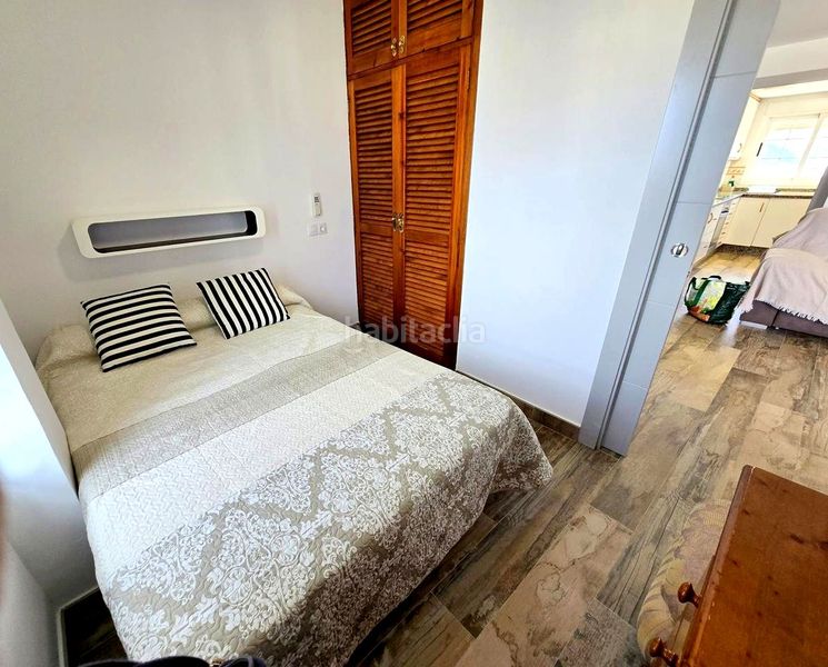 Foto 8ac35726-67e6-4aab-8837-ac4cfbc0ea55. Apartamento en calle de la devesa 7 atico playa reformado 3 habitaciones, 2 baños, salon , gran terraza, garaje, jardin, piscina y tenis en Gandia