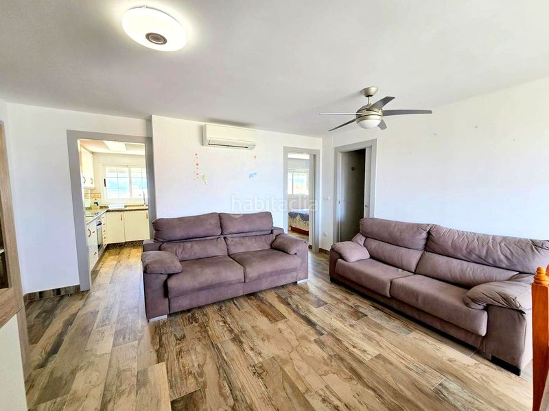 Foto 99a5d5e6-56e8-429d-8320-010c6c45c56a. Apartamento en calle de la devesa 7 atico playa reformado 3 habitaciones, 2 baños, salon , gran terraza, garaje, jardin, piscina y tenis en Gandia